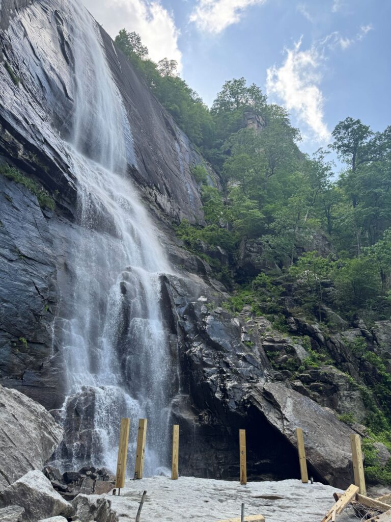 New fence posts installed on rock platform below Hickory Nut Falls.